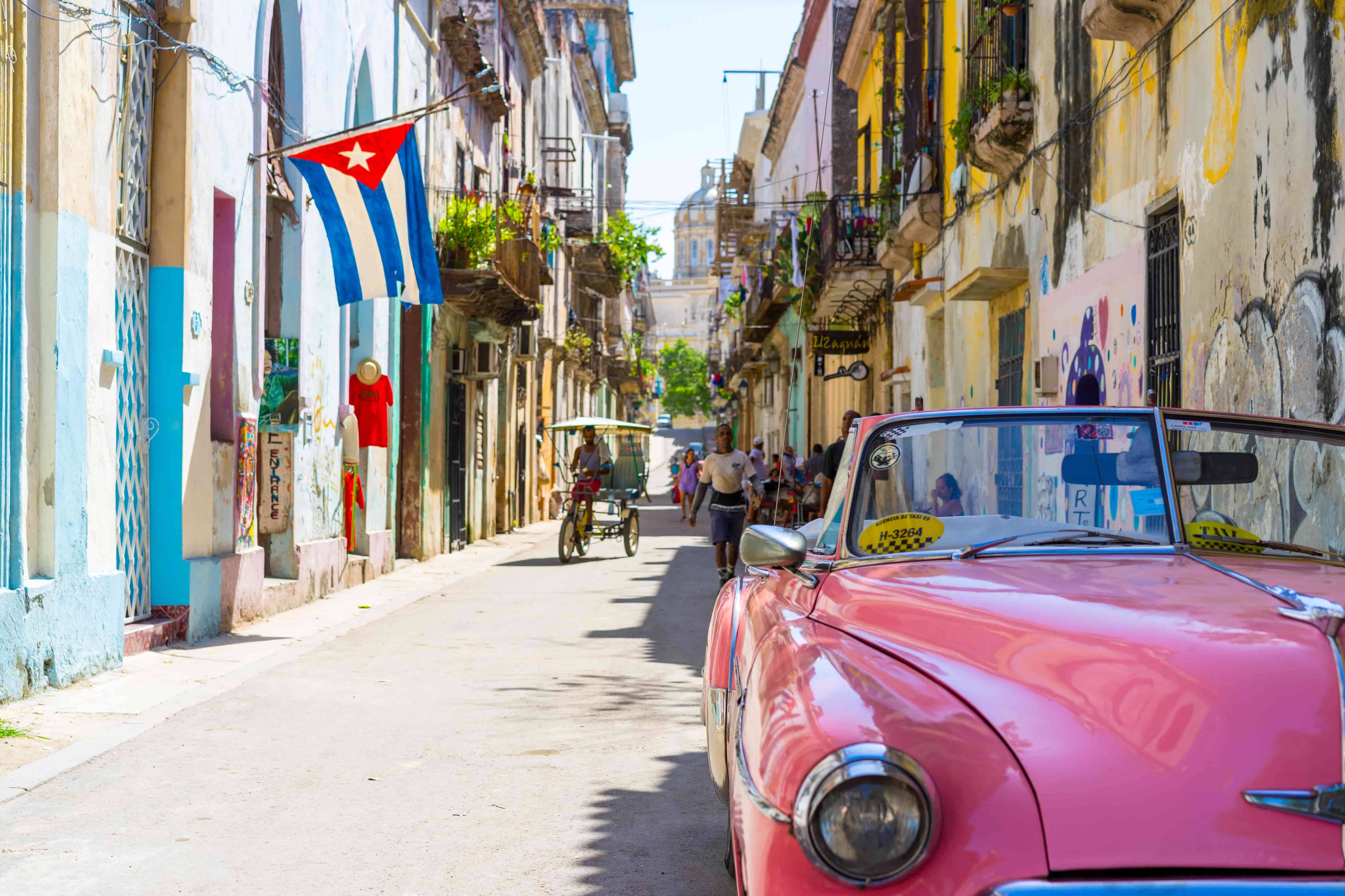 cuba car and flag